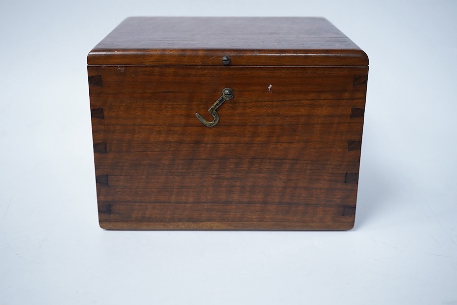 A turned wooden chess set in ebony and boxwood, king 10.5cm high, in a hardwood box. Condition - good.